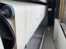 งานติดตั้งสายพานรีดผ้า NICHOLINE สำหรับเครื่องรีดผ้า