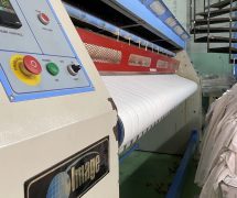 งานติดตั้งสายพานป้อนผ้าโพลีเอสเตอร์ NICHOLINE สำหรับเครื่องรีดผ้า IMAGE - 10