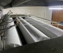 งานติดตั้งผ้าสักหลาดหุ้มลูกกลิ้ง NICHOLINE สำหรับเครื่องรีดผ้าแบบกระทะ - 21