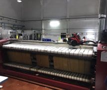 งานติดตั้งสายพานรีดผ้า NICHOLINE และเทปพันลูกกลิ้ง VERTEX สำหรับเครื่องรีดผ้า TOLKAR - 2