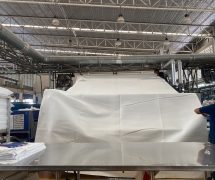 งานติดตั้ง ผ้าสักหลาดหุ้มลูกกลิ้ง VERTEX สำหรับเครื่องรีดผ้าแบบกระทะ IMAGE - 2