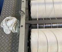 งานติดตั้ง ผ้าสักหลาดหุ้มลูกกลิ้ง VERTEX สำหรับเครื่องรีดผ้าแบบกระทะ IMAGE - 50