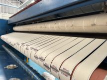 งานติดตั้งสายพานป้อนผ้าคอตตอน และ สายพานรีดผ้า NICHOLINE สำหรับเครื่องรีดผ้า CHICAGO - 8